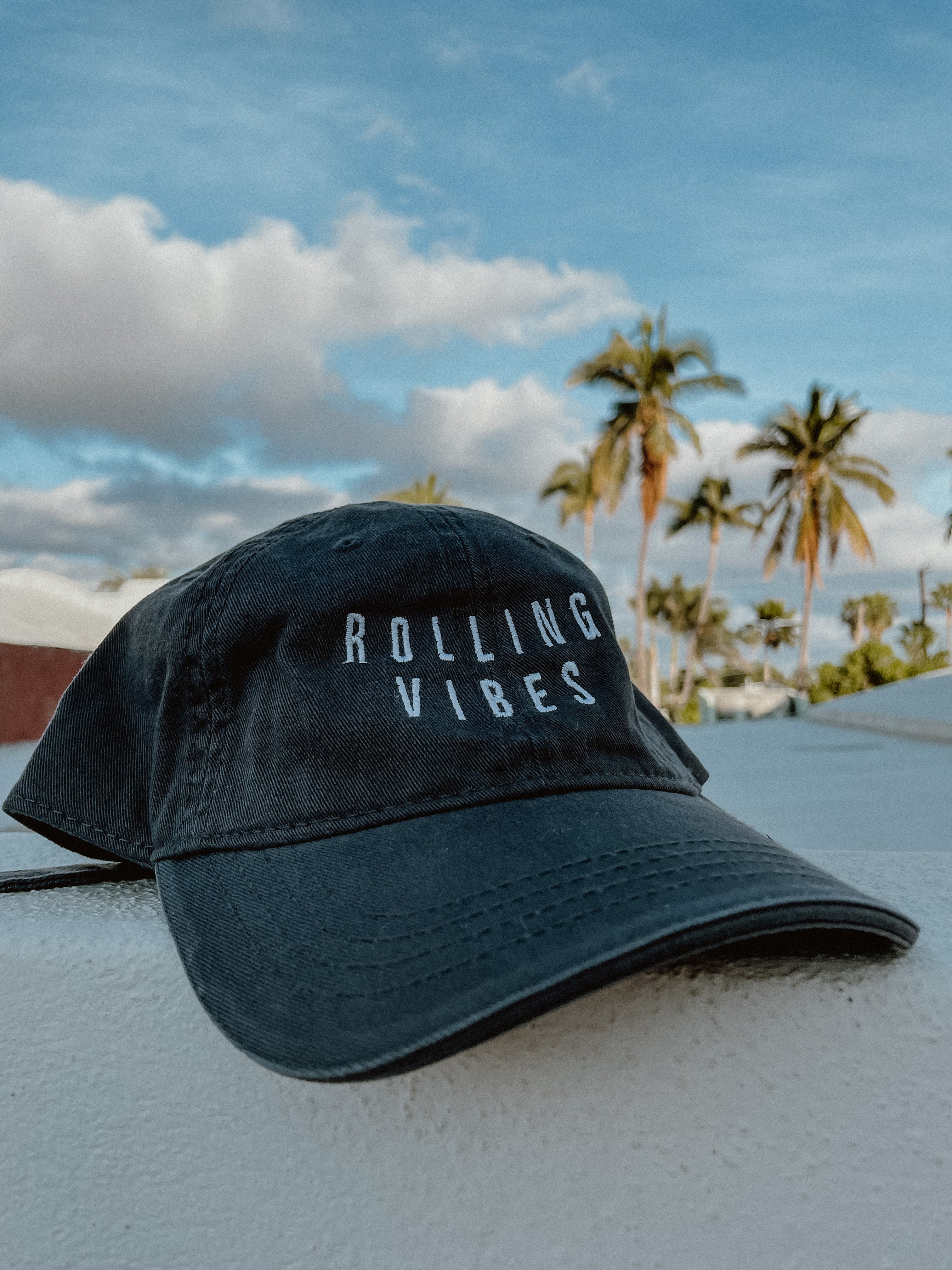 Green Rolling Hat "Dad Hat" with Rolling Vibes logo on front and "keep rolling till you find something you love" on back.